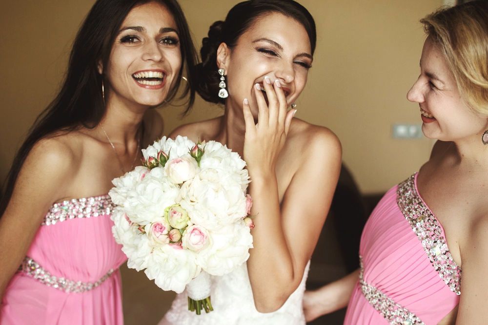 bride with her bridesmaids 